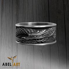 Japanese Dragon Silver Mythology Ring Gift for him, 925 Sterling Silver Biker Ring, Stackable Ring, Handmad Wedding Ring, Best Man Gift Discover meaningful gifts for him to find the perfect gifts for the men in your life.  Metal : 925k sterling silver Color : Oxidized Gram :15-18 Delivery & Shipment It usually takes 1-2 Business days to produce your handmade ring.  Don't forget to check other perfect jewelries of us, www.etsy.com/shop/AbelArtJewelry Asian Inspired Rings For Men, Japanese Rings Men, Wedding Ring Memorial, Meaningful Gifts For Him, Dragon Mythology, Silver Wedding Ring, Sterling Silver Wedding Rings, Japanese Dragon, Biker Rings