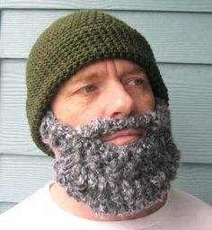 a man with a beard wearing a knitted hat