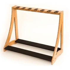 a wooden rack with two black bars on it