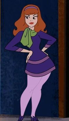 a woman with red hair and purple dress standing in front of an open door wearing green scarf