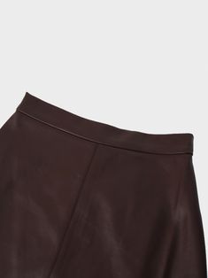 This stylish Leather A-Line Skirt-Brown is both chic and versatile. Its A-line cut flatters all body types, while the soft and supple material provides all-day comfort. Fitted Brown Asymmetrical Skirt, Brown Fitted Asymmetrical Skirt, Fitted Asymmetrical Brown Skirt, Elegant Brown Asymmetrical Skirt, Fitted Leather Flared Skirt, Elegant Brown Leather Bottoms, Classic Brown Knee-length Bottoms, Chic Brown Flared Skirt, Chic Brown Relaxed Skirt