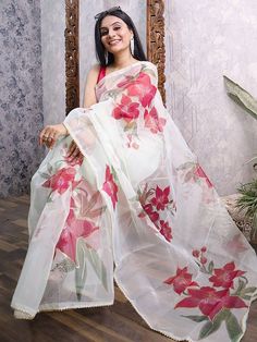 Real looks will come out through the dressing style and design with this gorgeous off-white color saree made with organza material accomplished with floral and foil printing. This off-white designer saree comes with a pink color blouse made with heavy banglory material. This lovely organza off-white party wear saree is 5.50 meters long and comes with unstitched 1.00-meter blouse material. This organza off-white party wear saree is a wonderful garment that elegantly flaunts the curves of a woman Semi-stitched White Organza Saree, White Traditional Wear For Diwali, Festive Off White Organza Saree, Festive Off-white Organza Saree, White Floral Print Traditional Wear For Eid, Festive White Traditional Wear With Floral Print, White Traditional Wear With Floral Print, White Floral Print Traditional Wear For Diwali, Floral Print Saree For Wedding