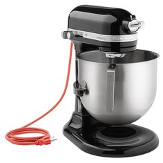 a black and silver mixer with an orange cord connected to the attachment on it's side