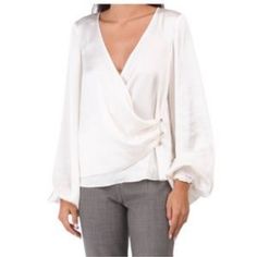 Questions? Leave A Comment Below! Elegant Off White V-neck Top, Silk Cream Top For Office, Cream Silk Top For Office, Elegant Off White Long Sleeve Tops, Cream Evening Tops For Spring, Cream Tops For Spring Evening, Cream Evening Top For Spring, Elegant Off-white Blouse For Work, Elegant Off White Blouse For Work