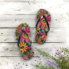 Embrace the vibrant energy of the 1960s with our Flower Power flip-flops. Inspired by the iconic era of peace, love, and colorful patterns, these flip flops are a stylish homage to retro fashion, perfect for adding a whimsical touch to your summer ensemble. : Materials: EVA, polyester, PVC : 5/8" (15 mm) thick EVA sole with a textured bottom : 100% polyester suede sole cover : Black PVC strap : Runs true to size : Multiple sizes US size women (S) 7 - 8 (M) 9 - 10 (L) 11 - 12 (XL) 13 - 14 US size men (S) 5 - 6 (M) 7 - 8 (L) 9 - 10 (XL) 11 - 12 Playful Summer Vacation Flip Flops, Fun Multicolor Non-slip Slippers, Retro Multicolor Open Toe Sandals, Playful Non-slip Flip Flops For Spring, Retro Sandals For Spring Vacation, Fun Non-slip Flip Flops For Summer, Fun Non-slip Summer Flip Flops, Playful Multicolor Flip Flops For Vacation, Playful Adjustable Multicolor Flip Flops