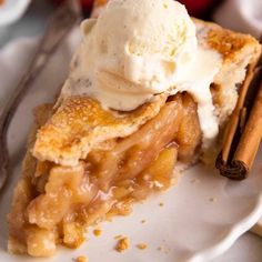 a slice of apple pie with ice cream on top