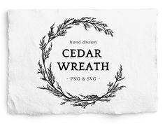 a white napkin with the words cedar wreath in black ink on it, and an image of