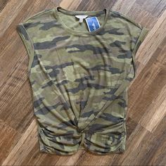 Lucky Brand Camouflage Shirt Cute Twist Knot In The Front Nwt Casual Camouflage Crew Neck Top, Camouflage Military Short Sleeve Tops, Military Camouflage Short Sleeve Tops, Camouflage Military Top With Short Sleeves, Spring Casual Camouflage T-shirt, Military Style Camouflage Short Sleeve Tops, Casual Camouflage T-shirt For Spring, Casual Camouflage Short Sleeve Tops, Military Style Khaki Top For Summer