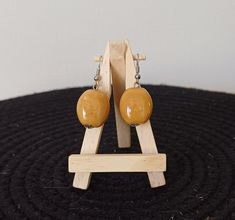 Dangling earrings, with yellow pearl Handmade Amber Beaded Round Earrings, Handmade Amber Round Bead Earrings, Handmade Amber Earrings With Round Beads, Yellow Single Dangle Earring, Single Yellow Dangle Earring, Brown Oval Earrings As A Gift, Brown Oval Earrings Gift, Brown Oval Earrings For Gift, Yellow Drop Hoop Earrings As Gift