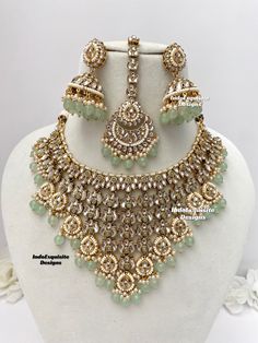 Premium quality Kundan Necklace comes with Jhumki Earrings and Tikka/ Indian Jewelry/Premium Quality Polki and Kundan Jewelry/mint color   All items are shipped from Brampton, Ontario, Canada. If you need your item by a certain day, please reach out to us for express delivery option before placing the order so that we can update the shipping for you. Standard shipping/delivery timeline Below are the delivery timeline estimates. We dispatch all orders by the next business day. ---> USA delivery timeline * 3-5 business days to major urban centers in USA. It may take 1-2 days extra to remote locations ---> Canada delivery timeline  * 2-3 business days - GTA  & Montreal  * 2-4  business days - Rest of Ontario/Quebec * 2-6 business days-  Rest of Canada    ---> Europe/Middle East timeline * 5-1 Pista Green Jewelry For Festive Wedding, Green Bollywood Bridal Sets For Reception, Green Chandbali Bridal Necklace For Reception, Heavy Green Jewelry Sets For Reception, Green Kundan Jewelry Sets For Reception, Wedding Jewellery Designs, Brampton Ontario, Kundan Necklace Set, Necklace Set Indian