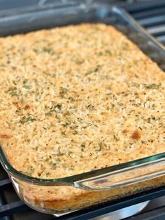 a casserole dish is being cooked on the grill