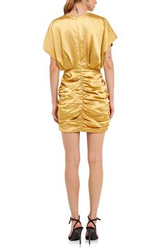 Ruched detailing at the skirt creates touchable texture on this charming minidress crafted from lustrous golden satin. Surplice V-neck Short sleeves Lined 100% polyester Hand wash, dry flat Imported Gold Silk Mini Dress For Evening, Mini Dress With Folds, Gold Satin Dress For Date Night, Gold Satin Mini Dress For Summer, Night Out Mini Dress With Folds, Gold Silk Mini Dress For Spring, Silk Ruched Mini Dress For Night Out, Satin Mini Dress With Ruched Sides For Date Night, Gold Silk Satin Dress For Night Out