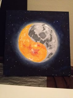 an orange and black painting on a canvas with the moon in the sky behind it