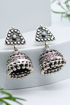 Silver toned oxidized handcrafted jhumkas with geometric top and carved drop with ghunghroo. - Aza Fashions Geometric Top, Fashion App, Aza Fashion, Silver Plate, Silver Plated, Silver Tone, Plating, Sparkle, Carving