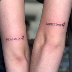 two people with matching tattoos on their arms that say to infinity and beyond