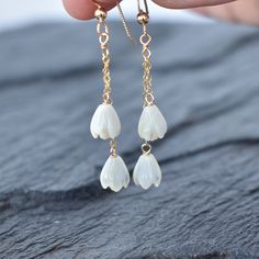 These earrings sway with your every movement and are very flattering! Two carved mother of pearl Pikake beads dangle gently from your choice of sterling silver or gold fill chain. This material will not tarnish and can even get wet! White Dainty Drop Threader Earrings, Delicate White Threader Earrings, Dainty White Linear Single Earring, White Linear Pierced Earrings For Gift, Delicate White Threader Earrings For Gift, White Linear Pierced Earrings As Gift, Delicate White Threader Earrings As Gift, White Linear Earrings As A Gift, White Threader Earrings With Ear Wire For Gift