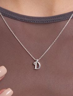 Introducing our Sterling Silver Letter Necklace, a delicate expression of personal style. This Tiny Initial Necklace features the letter "D," elegantly crafted to adorn your neckline with subtle charm. Plated in lustrous gold, this Dainty Initial Necklace adds a touch of sophistication to any outfit. Embrace individuality with this Small Monogram Necklace, a timeless accessory that speaks volumes in its simplicity. 🌸  Each piece is meticulously crafted, offering a unique and intimate touch. Ide D Necklace Initial, D Initial Necklace, Letter D Necklace, Silver Letter Necklace, D Necklace, Bracelet Stands, Letter Necklace Silver, Initial Necklace Silver, Dainty Initial Necklace