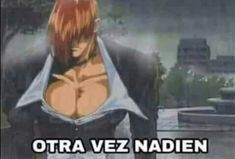 an anime character with red hair standing in front of a cityscape and text that reads otra vez nadden