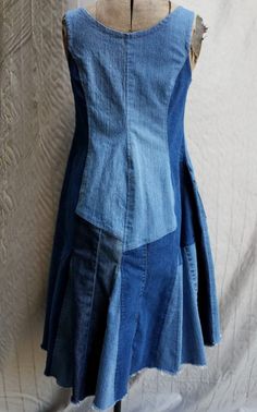 a dress made out of old jeans on a mannequin