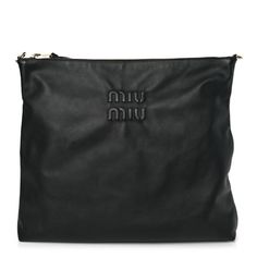 This an authentic MIU MIU Soft Calf Softy Shoulder Bag in Black. This impressive handbag is crafted of beautifully smooth calfskin leather in black. The bag features an embossed Miu Miu logo. The top zipper opens to a nylon interior with a zipper pocket. Miu Miu Bag Black, Miu Miu Logo, Miu Miu Bag, Shoulder Bag Black, Miu Miu, Zipper Pocket, Calf Skin, Shoulder Bag, Zipper