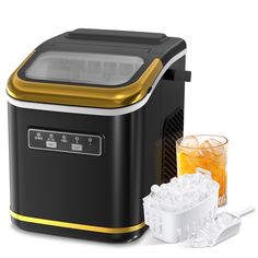 a black and gold ice maker next to an iced drink