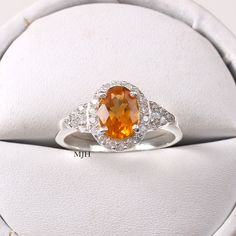 Oval Orange Topaz Ring With Center Stone, Orange Oval Sapphire Gemstone Ring, Orange Oval Sapphire Ring, Orange Oval Topaz Promise Ring, Orange Oval Topaz Ring For Gift, Orange Oval Topaz Ring Gift, Oval Orange Topaz Gemstone Ring, Oval Orange Topaz Ring For Promise, Oval Orange Topaz Promise Ring