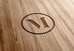 a wooden table with the letter n on it's side and a circle in the middle