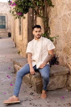 This beautiful Guayabera for Men is embroidered with a Traditional Ethnic design and adds a sophisticated flare to your wardrobe.  This elegant button up Shirt is perfect for special occasions such as Mexican Fiestas, Quinceañeras, Weddings, etc. It has two pockets on the bottom part of the shirt.  This guayabera is made by Mexican Artisans in Mexico. More style available here: https://www.etsy.com/es/shop/SoleiEthnic?ref=seller-platform-mcnav&section_id=26873542 Mens Fiesta Outfit, Puerto Rican Mens Fashion, Bachata Outfit Men, Men Quinceanera Outfit, Mens Guayabera Outfit, Quinceanera Men Outfit, Mexican Wedding Outfit Men, Mexican Mens Outfits, Mexican Outfits Men