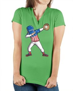 a woman wearing a green shirt with an american baseball player on it's chest