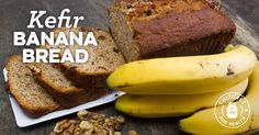 there is a loaf of banana bread next to some bananas