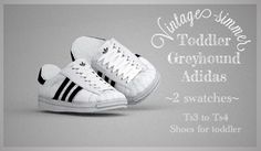 a pair of adidas shoes with the words, vintage - style toddler greyhound adidas