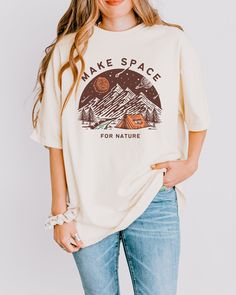 Featuring a camping scene and the night sky with planets and stars, these soft tees are printed on garment-dyed Comfort Colors shirts for that lived-in, vintage look and feel. Please refer to the size charts to find the perfect fit! ⭐Good to Know: Made using 100% US cotton that is ethically grown and harvested. Gildan is also a proud member of the US Cotton Trust Protocol, ensuring ethical and sustainable means of production. ⭐Details: ✨Oeko-Tex certified non-toxic dyes ✨100% combed and ring-spu Casual Custom Print Tops For Camping, Casual Tops With Custom Print For Camping, Relaxed Fit Graphic Print Top For Adventure, Graphic Tee With Letter Print For Camping, Soft-washed Relaxed Fit T-shirt For Outdoor, Letter Print Relaxed Fit Tops For Camping, Relaxed Fit Graphic Tee For Outdoor, Graphic Tee With Relaxed Fit For Camping, Graphic Tee T-shirt With Relaxed Fit For Camping