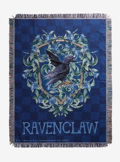 the ravenclaw throw is shown with blue and green leaves, surrounded by an image of a black bird