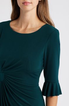 Stretch-enhanced fabric offers desk-to-dinner comfort in a dress framed by ruffled sleeves and finished with front pleats for a gathered affect. 40" length (size 8) Jewel neck Elbow-length sleeves Partially lined 100% polyester Machine wash, tumble dry Imported Green Formal Dress With Pleated Sleeves, Formal Ruched Fit And Flare Dress, Elegant Green Midi Dress With Pleated Sleeves, Green Pleated Sleeve Dress For Work, Green Workwear Dress With Pleated Sleeves, Fall Formal Dresses With Gathered Sleeves, Fitted Flutter Sleeve Dresses For Fall, Elegant Ruched Pleated Formal Dress, Fitted Green Midi Dress With Pleated Sleeves