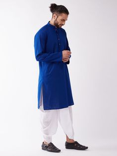 VASTRAMAY Men's Blue And White Cotton Blend Kurta And Dhoti Set A stylish blend of tradition and comfort, the VASTRAMAY Men's Blue And White Cotton Blend Kurta And Dhoti Set offers a perfect ensemble for festive occasions. Crafted from soft cotton blend fabric, it ensures both elegance and ease of movement. Features Elegant blue and white combination Comfortable cotton blend fabric Perfect for festive wear Specifications Material: Cotton blend Color: Blue and White Sizes Available: S, M, L, XL, Traditional Indigo Kurta With Dabka, Traditional Indigo Kurta With Pallu, Traditional Royal Blue Kurta With Traditional Drape, Cotton Blue Sherwani For Festivals, Blue Cotton Sherwani For Festivals, Traditional Royal Blue Kurta For Diwali, Traditional Royal Blue Kurta With Dabka, Traditional Royal Blue Dabka Kurta, Blue Cotton Straight Kurta Sherwani