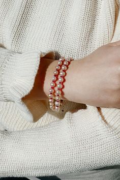 What a gentle, sweet feeling emanates from this delicious ‘peach’ shade of pearls! Adding a touch of garnet-red between pearls is like adding the word ‘love’ to a sentence. Bringing joy to your eyes and a healing touch to your wrist, this bracelet amplifies its purpose with double strands. Stones: Freshwater pearls, garnet Material: 14k gold-filled Length: 7" + 1.5" extender Elegant Red Bracelets For Everyday, Elegant Red Casual Bracelets, Pearl White Hand-strung Bracelet For Gift, Cream Pearl Bracelet Gift, Gift Cream Pearl Bracelet, Elegant Red Beaded Pearl Bracelet, Cream Beaded Pearl Bracelet As A Gift, Cream Beaded Pearl Bracelet Gift, Cream Beaded Pearl Bracelet For Gifts