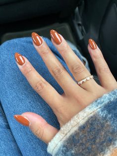 Girl with long nails that has orange/brown nail
color. Fall nails inspiration for 2022 Gel Nails Terracotta, Orange September Nails, November Thanksgiving Nails, Between Summer And Fall Nails, Fall Nails Orange And Brown, Terracotta Nails Acrylic, Fall Season Nails Acrylic Short Almond, Fall Solid Nails, California Nails Ideas