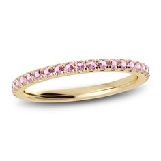 This modern take on an eternity ring features a full circle band of delicate yet sparkly natural pink tourmaline gemstones from the Juliette Maison™ collection. Fashioned in 10K yellow gold, Wear to add a subtle sparkle to any finger, or style as an accent to your go-to stack of rings. Pink Wedding Bands For Women, Pink Wedding Band, Jewelry Style Guide, Diamond Solitaire Earrings, Wedding Band Styles, Pink Tourmaline Ring, Jared The Galleria Of Jewelry, Diamond Anniversary, Eternity Ring Diamond