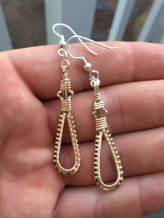 These dangle/drop earring were hand wrapped using only the finest Argentium Silver wire and 14 karat yellow gold filled wire. Intricately woven with time and care one piece at a time. Never mass produced. The ear hooks are fine Argentium Silver. Argentium silver is a finer quality than traditional sterling, yet is extremely resistant to tarnish. All of my Argentium silver is nickel free. They are light weight and are a unique, eye catching addition to any collection. Available in all silve Williamsburg Va, Wrapped Earrings, Gold Filled Earrings, Argentium Silver, Wire Wrapped Earrings, Wrapped Jewelry, Drop Earring, Wire Wrapped Jewelry, Silver Wire