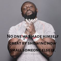 a man is holding his hands together with the words, no one has made himself great by showing how small someone else is