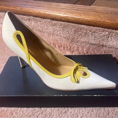 Bcbg Maxazria Off-White Leather Stiletto Pumps W/Canary Yellow Bow Design *Brand New* Size 6.5 B Color Off-White W/Canary Yellow Ribbon Design Pointed Toe Heel Approx 3.25” Leather Upper/Lower Sole Made In Brazil White Kitten Heels With 4-inch Heel For Formal Occasions, Cream Kitten Heels For Spring, White Spring Court Shoes For Office, White Court Shoes For Office In Spring, White Court Shoes For Spring Office Wear, White Round Toe Kitten Heels For Evening, White Kitten Heels With Round Toe For Evening, White Court Shoes For Summer Evening, Designer Spring Kitten Heels For Formal Occasions