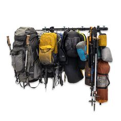 hiking and camping gear storage Gear Closet, Garage Wall Storage, Camping Rucksack, Camping Gear Survival, Bike Wall Mount, Wall Storage Systems, Camp Gear, Kayak Storage, Overland Truck