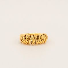 A modern statement piece that marries structure with fluidity. The distinctive woven design creates an architectural silhouette, while the textured surface catches and reflects light with every movement. The bold yet refined pattern transforms this ring from a simple band into an artful expression of contemporary elegance. Specifications: Finish: 18K gold plated Core: Titanium steel Simple Band, Woven Design, Statement Pieces, 18k Gold, Wonder, Band, Ring, Gold, Pattern