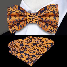 Elevate Your Style with Our Exquisite Floral Silk Bow Tie Are you ready to add a touch of elegance and sophistication to your wardrobe? Look no further than our Exquisite Floral Silk Bow Tie. Crafted from luxurious silk and featuring a detailed floral pattern in shades of orange and dark blue, this bow tie is the perfect accessory to elevate your look for any occasion. Whether you're attending a wedding, a business meeting, or a formal event, our versatile bow tie is sure to make a statement and Elegant Blue Sets With Floral Print, Elegant Blue Set With Floral Print, Elegant Blue Floral Print Sets, Elegant Multicolor Ties For Wedding, Elegant Multicolor Wedding Ties, Formal Silk Sets With Floral Print, Elegant Multicolor Evening Sets, Elegant Multicolor Party Sets, Elegant Floral Print Accessories For Black Tie