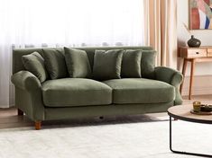 a living room scene with focus on the sofa