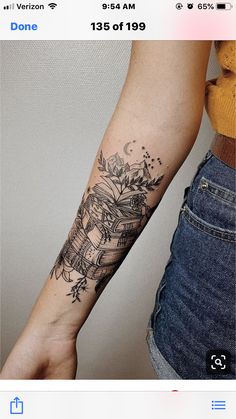 a person with a flower tattoo on their arm