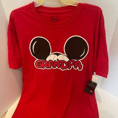 Dsiney Mickey Mouse Grandpa T-Shirt Size Small Brand New Tags Still On Item Mickey Mouse Short Sleeve Shirt, Mickey Mouse Short Sleeve Fan Merchandise Shirt, Mickey Mouse Short Sleeve Top For Fans, Mickey Mouse Cotton Short Sleeve T-shirt, Mickey Mouse Graphic Tee With Crew Neck, Cotton Mickey Mouse Short Sleeve T-shirt, Short Sleeve Mickey Mouse Tops For Fans, Casual Mickey Mouse Crew Neck T-shirt, Red Short Sleeve Top With Mickey Mouse