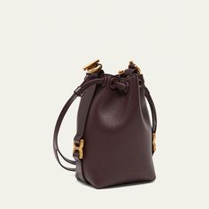 Chloe "Marcie" bucket bag in grained leather  Chain crossbody strap, 20" drop Drawstring closure  Lining: Leather Approx. 7.4"H x 4.3"W Professional cleaning recommended Made in Spain Formal Crossbody Bucket Bag With Gold-tone Hardware, Formal Crossbody Bucket Bag With Metal Hardware, Everyday Luxury Crossbody Bucket Bag With Gold-tone Hardware, Everyday Luxury Gold-tone Hardware Crossbody Bucket Bag, Modern Bucket Bag With Chain Strap For Formal Occasions, Modern Formal Bucket Bag With Chain Strap, Chloe Marcie, Professional Cleaning, Leather Chain