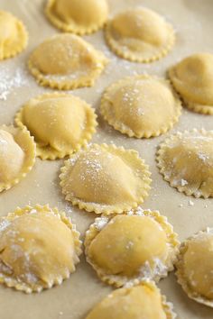 small pastries are sitting on a baking sheet