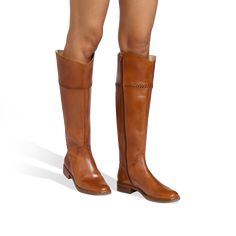 Ride into fall with our new Adaline Riding boot. Done in beautiful leathers with a whipstitch detail at the cuff, this boot is versatile and stylish. --details-- 1" Heel Height 16.53" Shaft Height 15" calf circumference Leather Upper Fabric Shaft + Pig Collar Lining Manmade Sole Style Number: 142231BT09 Sneaker Heels Wedges, Flat Wedges, Riding Boot, Wedding With Kids, Heels & Wedges, Flat Sneakers, Sneaker Heels, Wedge Boots, Kids Sneakers